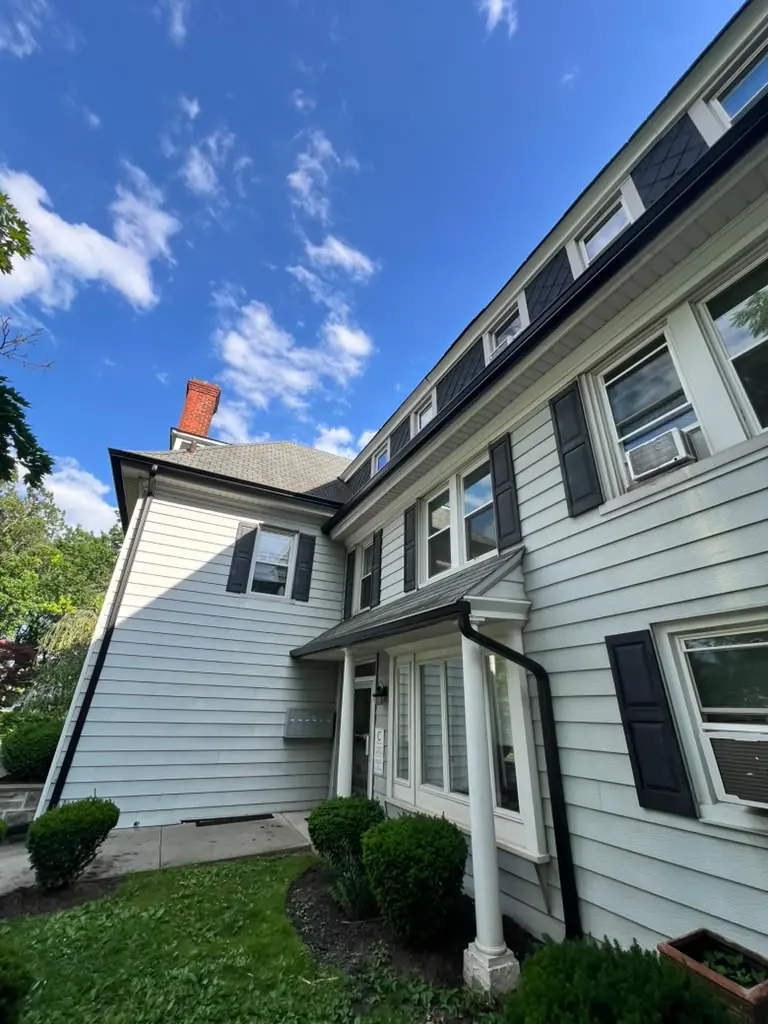 New gutters on a colonial with a complex roofline