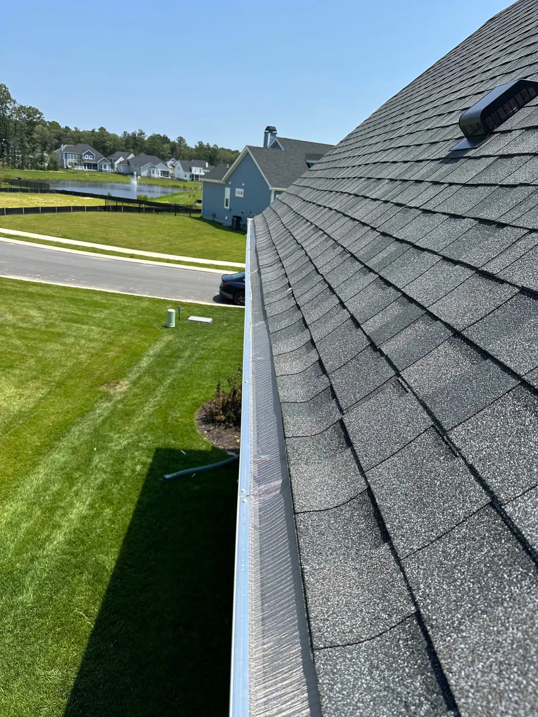 Finished roofline with gutter guards installed