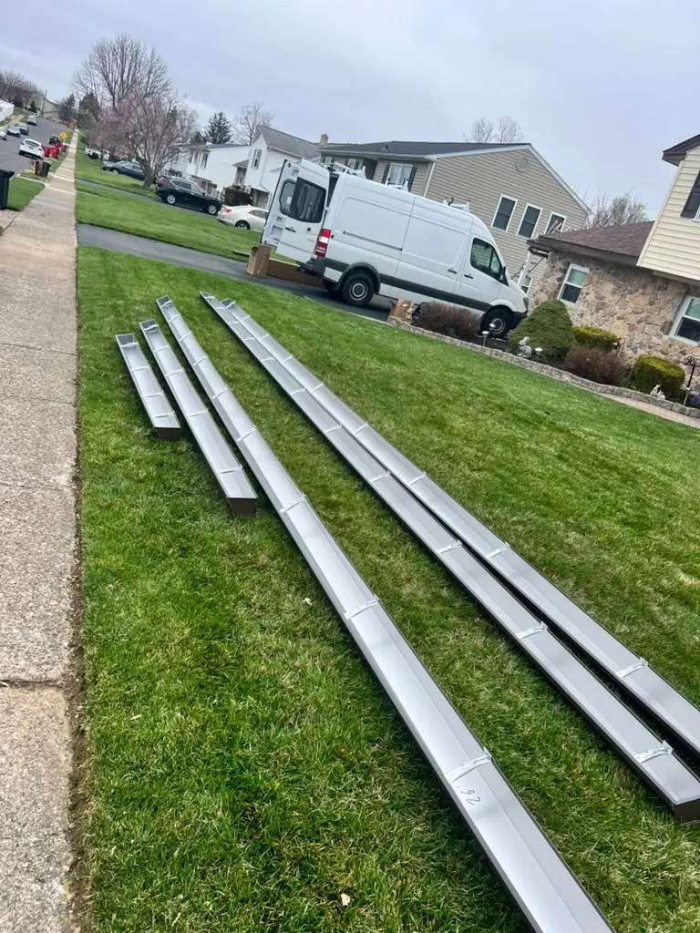 Freshly formed seamless gutters ready to install